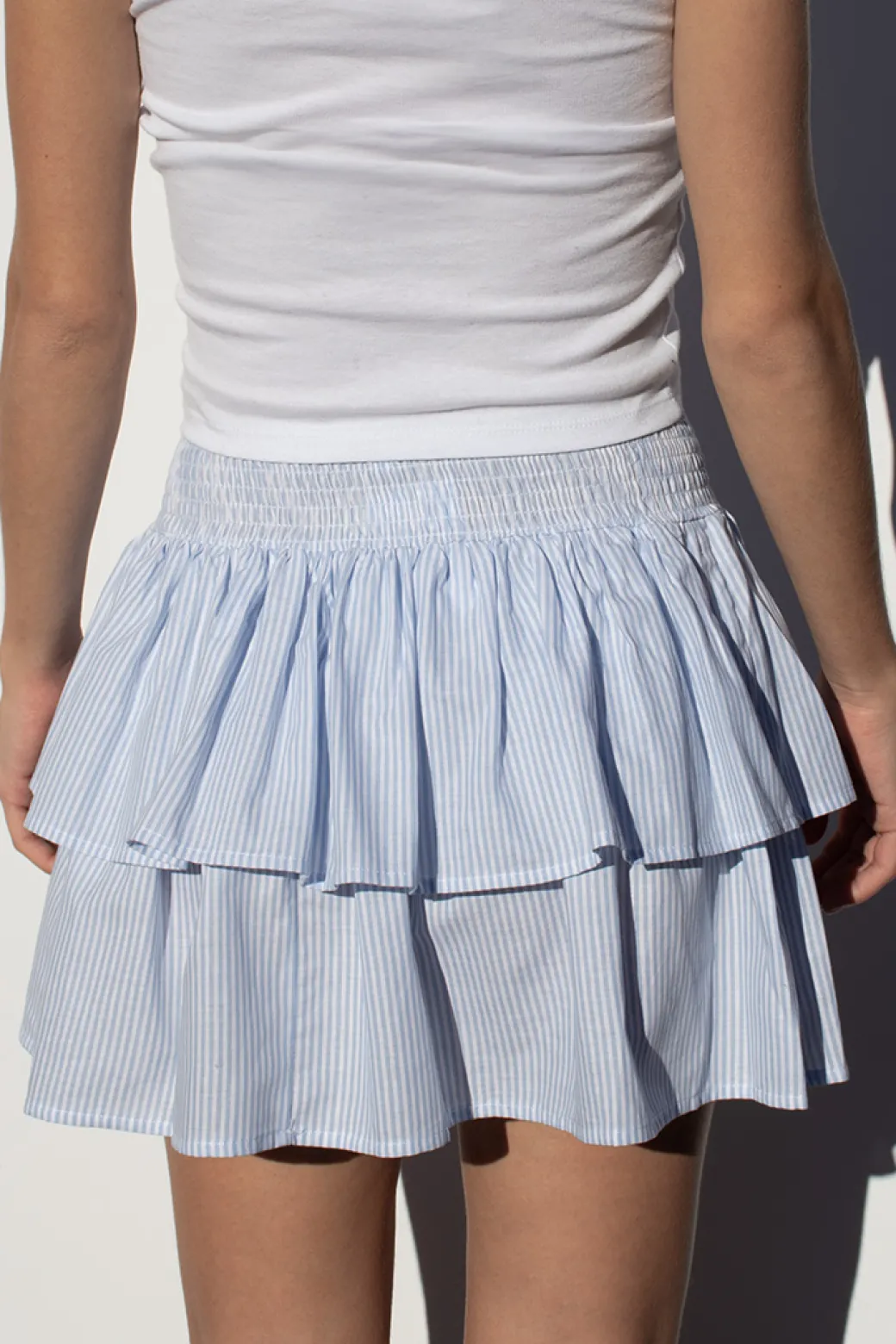 Falda elástica con dos volantes