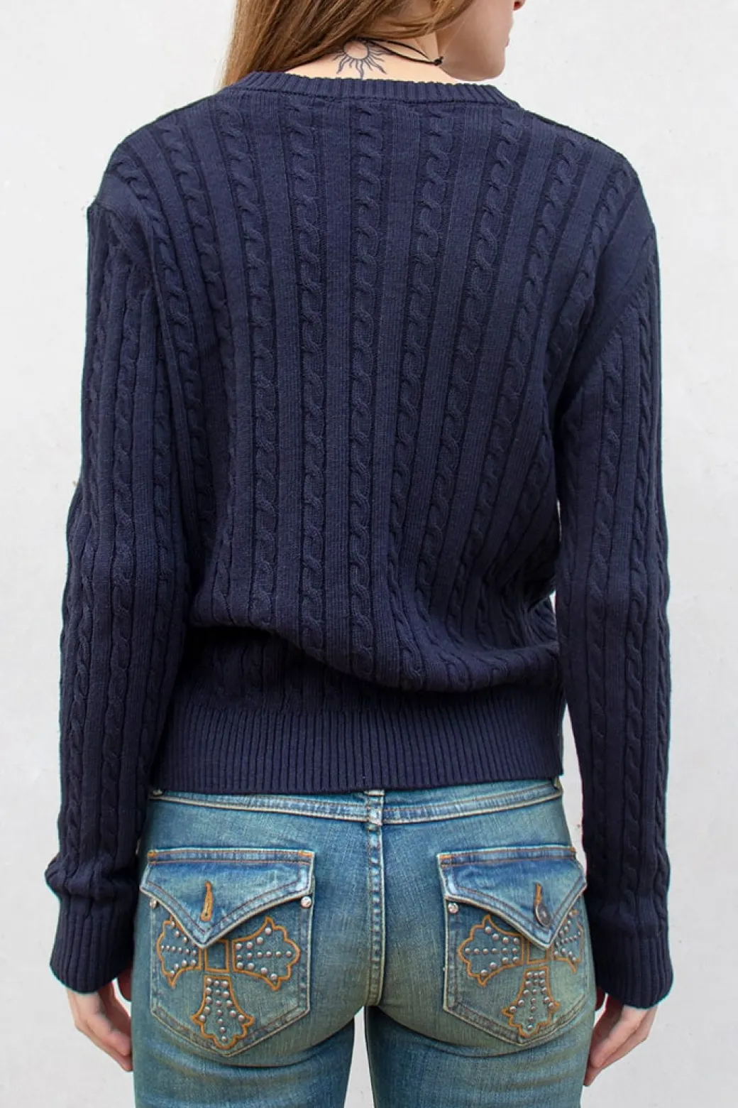 Jersey escote en V a trecce