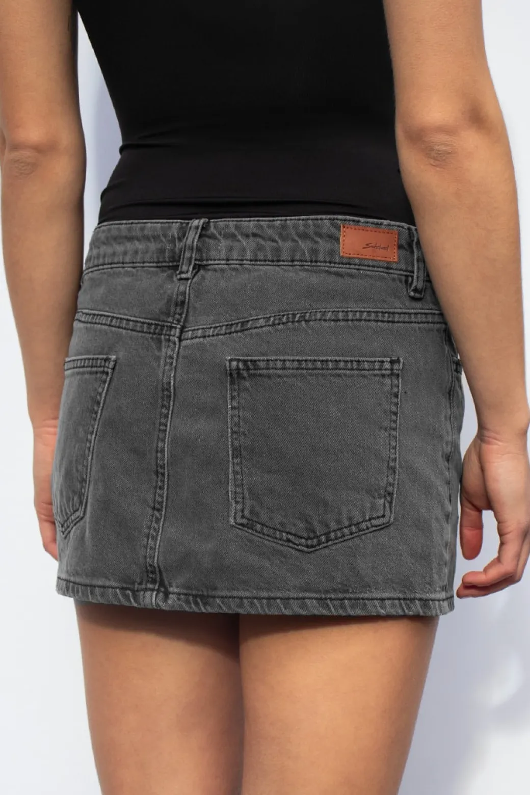 Mini falda low waist